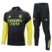 Chándal Real Madrid 2025/26 - Negro/Amarillo