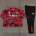 Manchester United 2025/26 Kinder Sportanzug Rot Schwarz