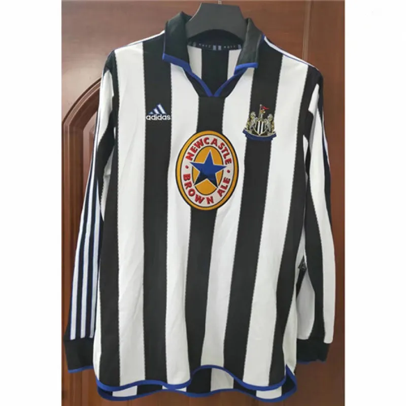 Maillot rétro domicile à manches longues de Newcastle United 1999/00 - Noir/Blanc