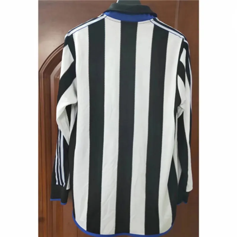 Maillot rétro domicile à manches longues de Newcastle United 1999/00 - Noir/Blanc