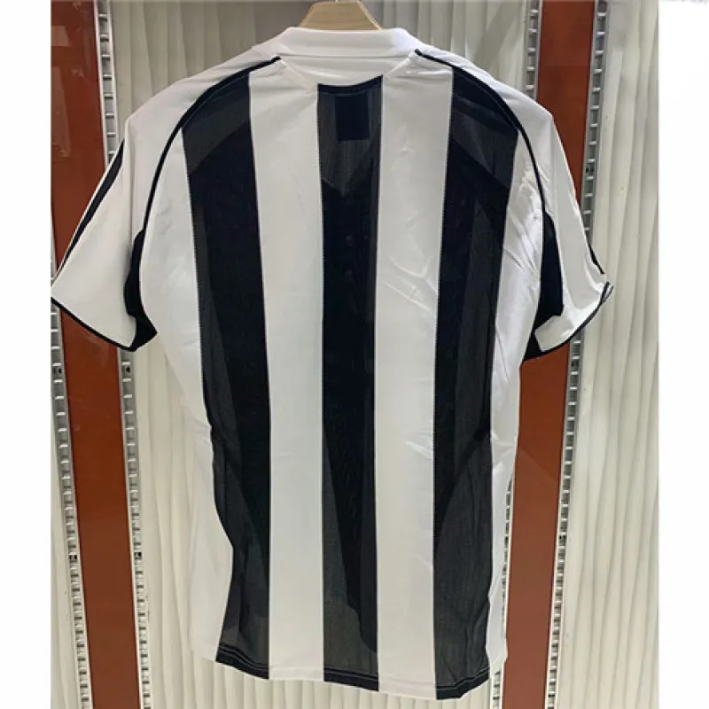 Maillot domicile rétro de Newcastle United 2005/06 - Noir/Blanc