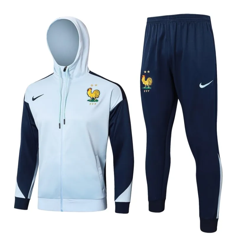 El traje deportivo con capucha y los pantalones de la selección nacional francesa para la temporada 2024/25 - blanco/azul.