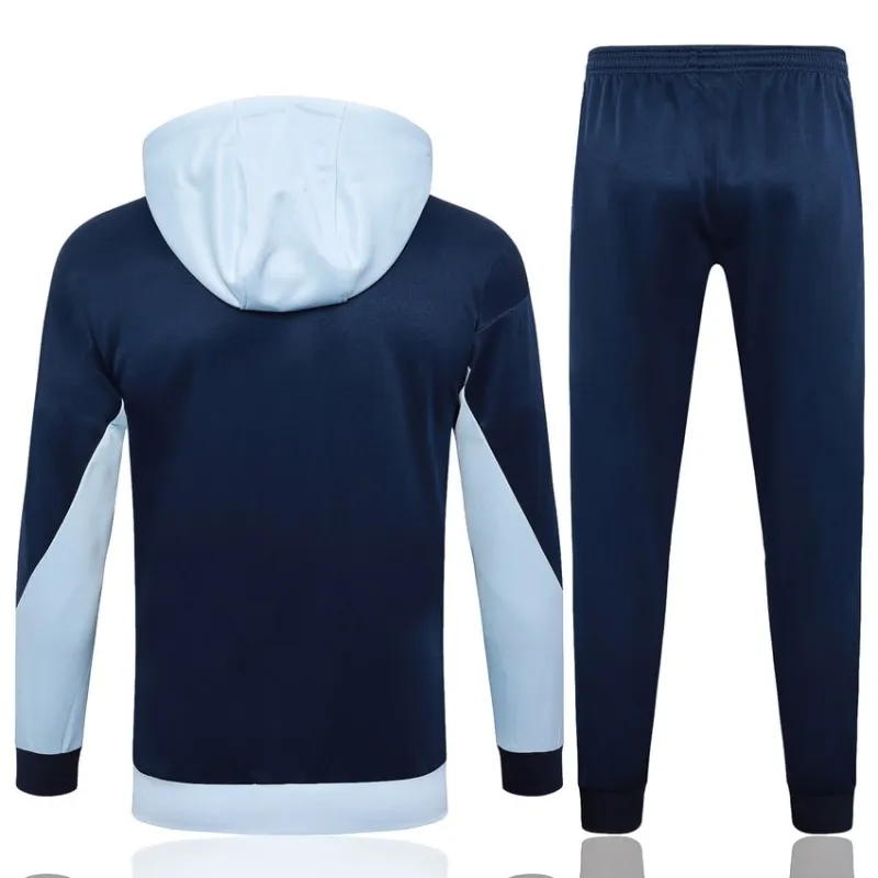 El traje deportivo con capucha y los pantalones de la selección nacional francesa para la temporada 2024/25 - blanco/azul.