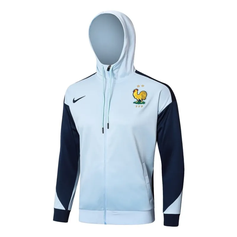 El traje deportivo con capucha y los pantalones de la selección nacional francesa para la temporada 2024/25 - blanco/azul.